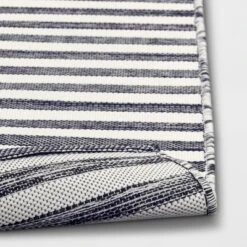 7'x10' Narrow Wornstripe Rectangular Woven Outdoor Area Rug Navy Blue - Threshold™ 5 7'x10' Narrow Wornstripe Rectangular Woven Outdoor Area Rug Navy Blue - Threshold™ -Threshold GUEST 899b548d f416 4892 bc7a 3d8cdcf92d5b