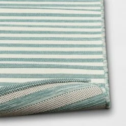 5'x7' Narrow Wornstripe Rectangular Woven Outdoor Area Rug Turquoise Blue - Threshold™ 5 5'x7' Narrow Wornstripe Rectangular Woven Outdoor Area Rug Turquoise Blue - Threshold™ -Threshold GUEST de24221f eb98 4b3d 8215 da45667ce98e